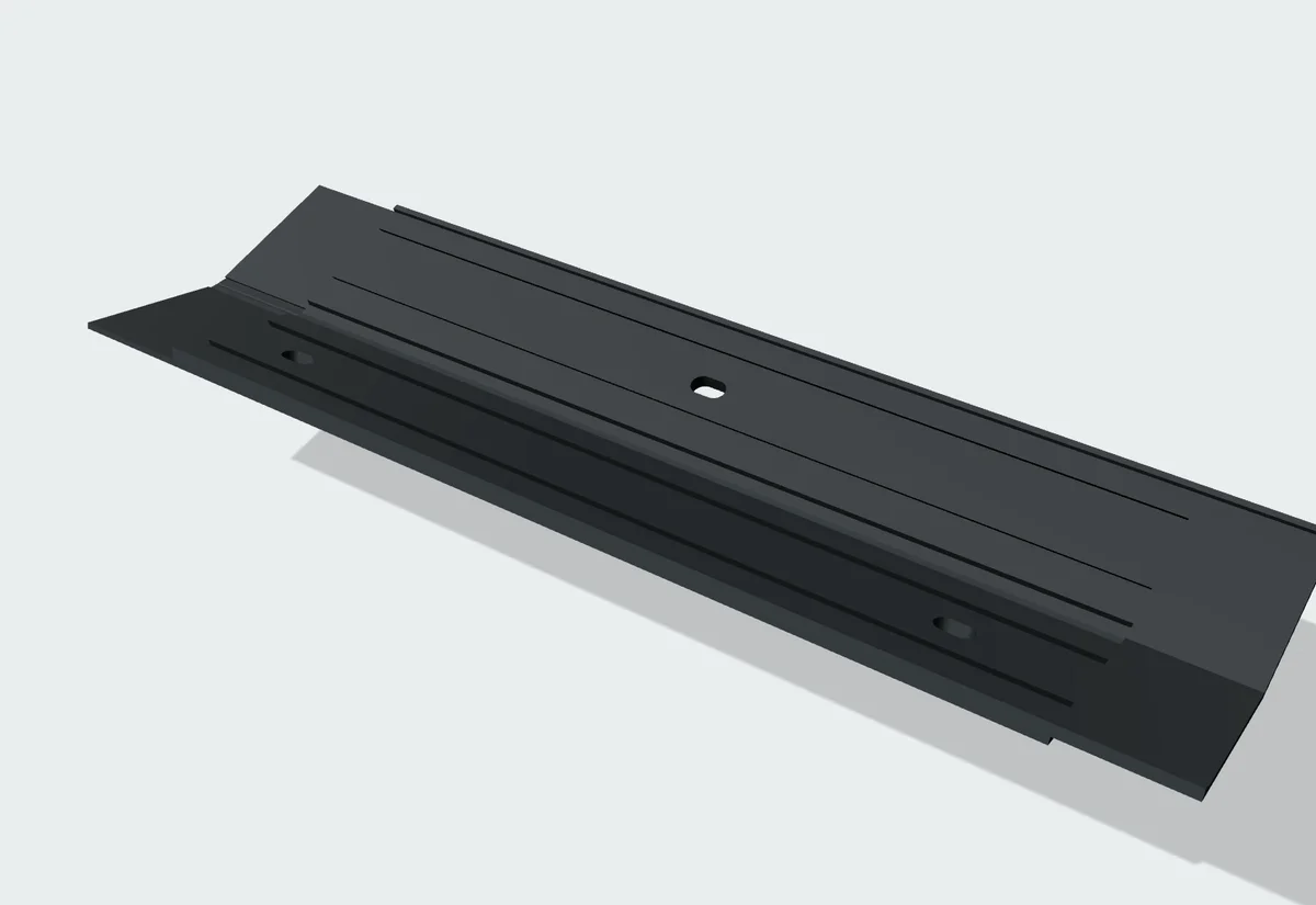 Rendering of a seam cap flipped over to show its grooved underside and screw slots.